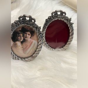 Two Vintage Small Oval Pewter Photo Frames Ribbon Floral Design Black Ve…